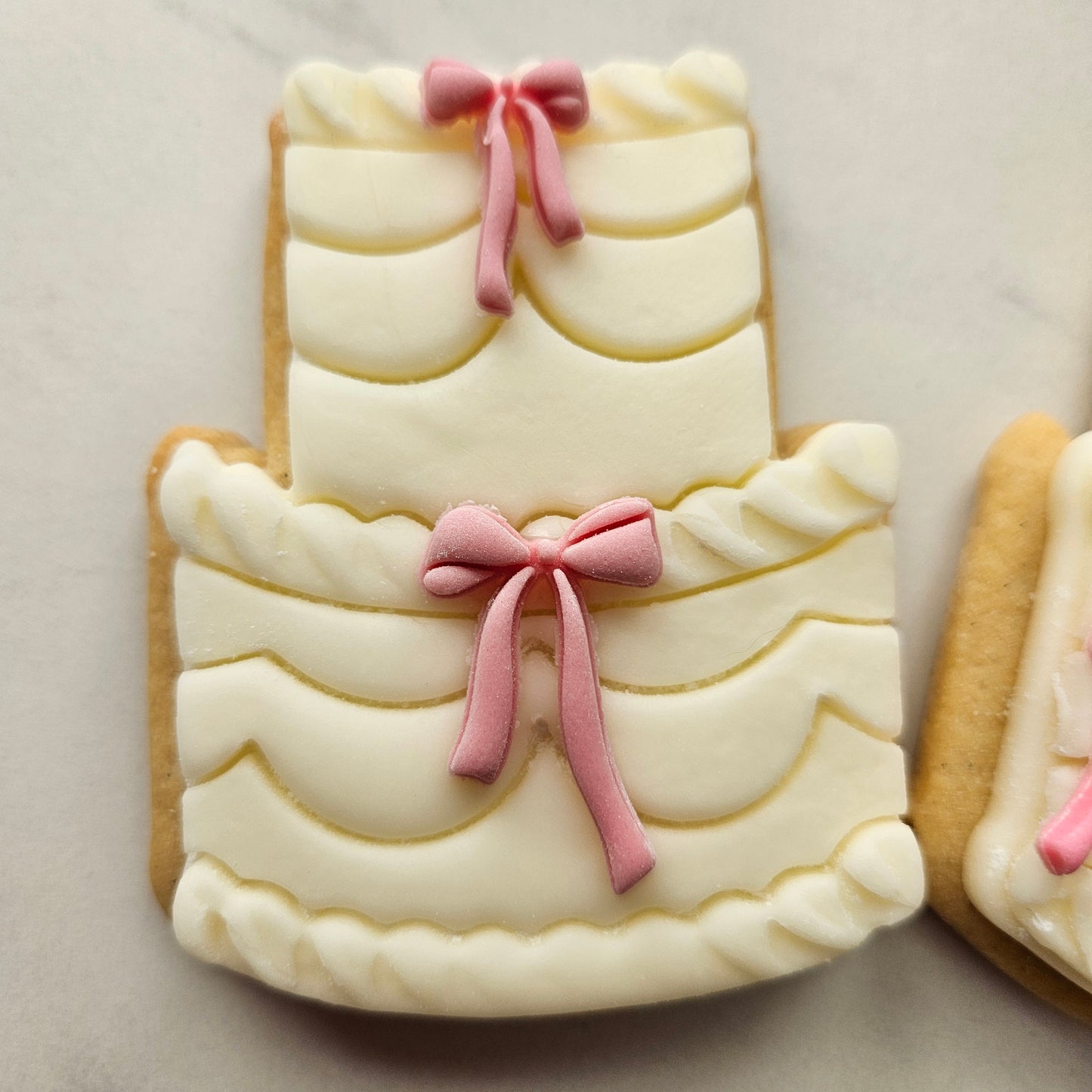 Cake with Mini Bow Fondant and Buttercream Stamp and Cutter Set